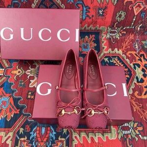 Gucci Women's Burgundy Flats with Gold Accents